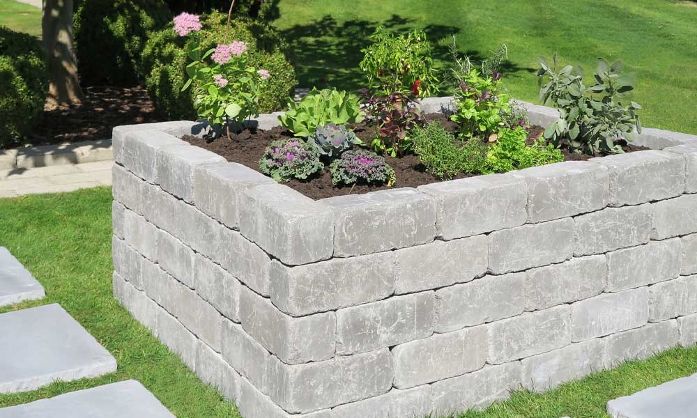 Palisade Grado anthrazit als Hochbeet mit den Außenmaßen ca. 162,5 x 133 x 62,5 cm cm aus 90 Steinen (Innenmaße ca. 137,5 x 108 cm) Palisade Grado anthrazit als Hochbeet mit den Außenmaßen ca. 162,5 x 133 x 62,5 cm cm aus 90 Steinen (Innenmaße ca. 137,5 x 108 cm)